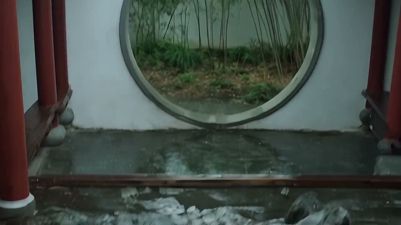 The camera passing through a moon gate in a Chinese garden to a koi pond among rocks — generated with Wan.